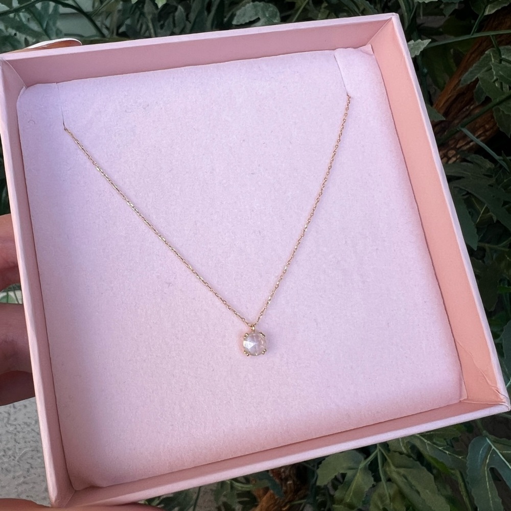 Solid Gold Shimmering White Sapphire
Pendant Necklace from Local Eclectic.